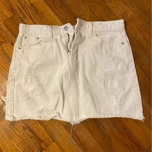 White denim ripped mini skirt